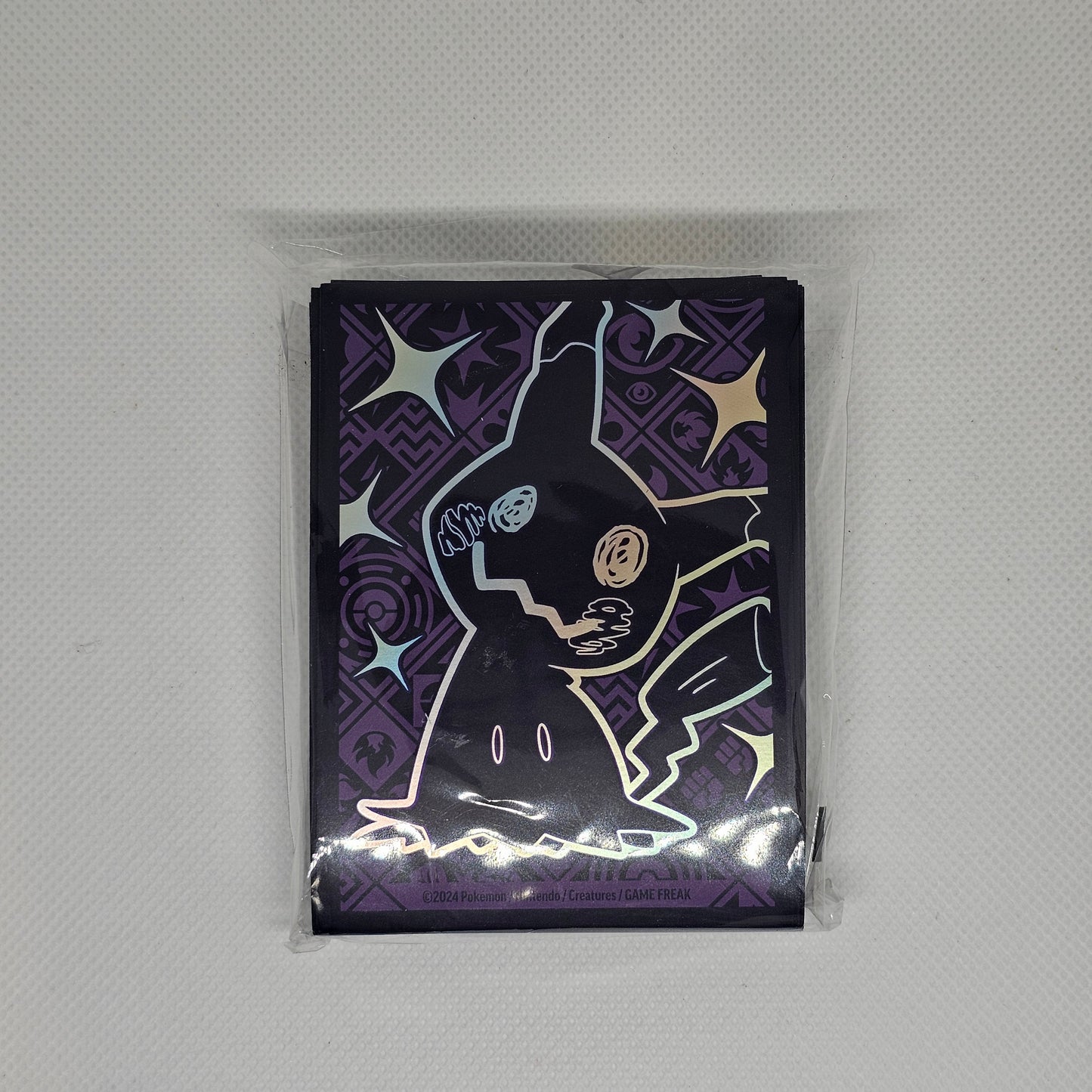 Paldean Fates: paquete de 60 protectores