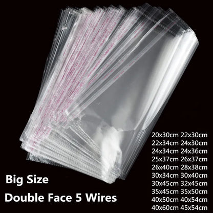 StoBag 100 sacs auto-scellants transparents pour vêtements – Sacs d'emballage en plastique transparent avec fermeture adhésive pour t-shirts, cadeaux, mariages et fêtes
