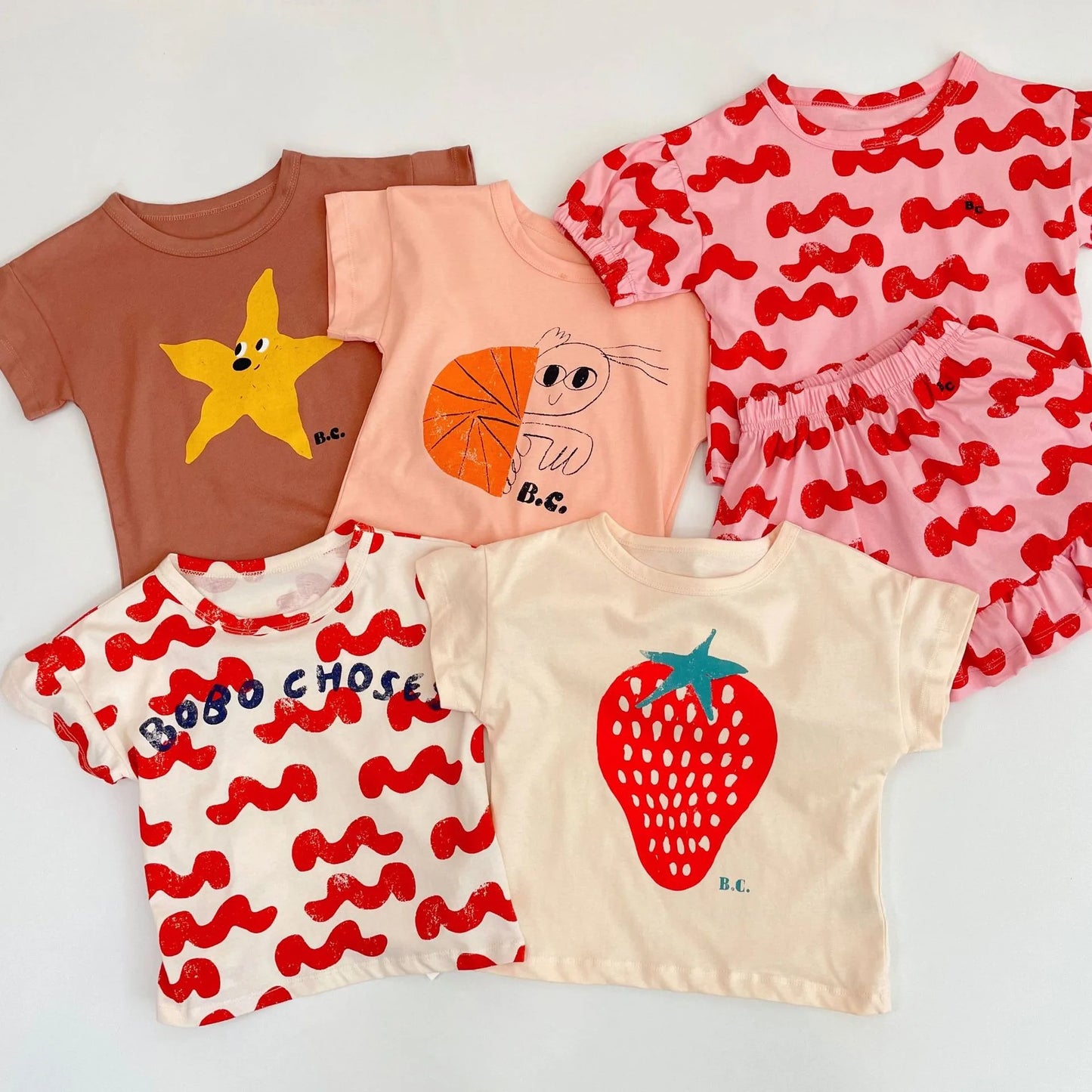 Camiseta de algodón con dibujos animados para niños 2025 – Top de manga corta estilo coreano de primavera-verano para bebés niños y niñas, ropa exterior informal para uso diario.