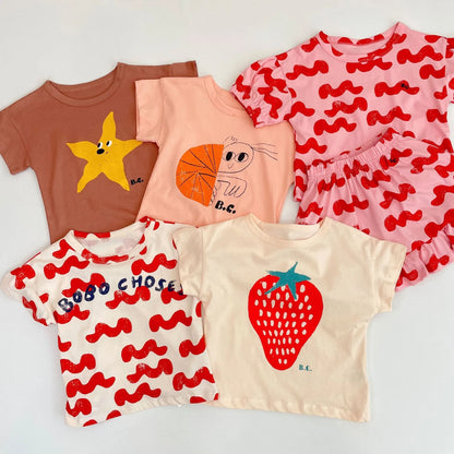 Camiseta de algodón con dibujos animados para niños 2025 – Top de manga corta estilo coreano de primavera-verano para bebés niños y niñas, ropa exterior informal para uso diario.