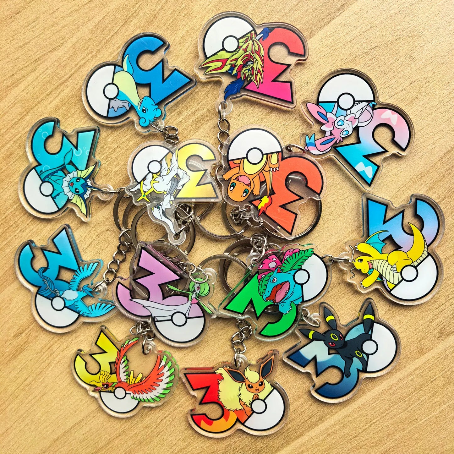 Pokémon 30th Anniversary Acrylic Keychain – Captain Pikachu, Eevee & Eeveelutions (50 Styles)
