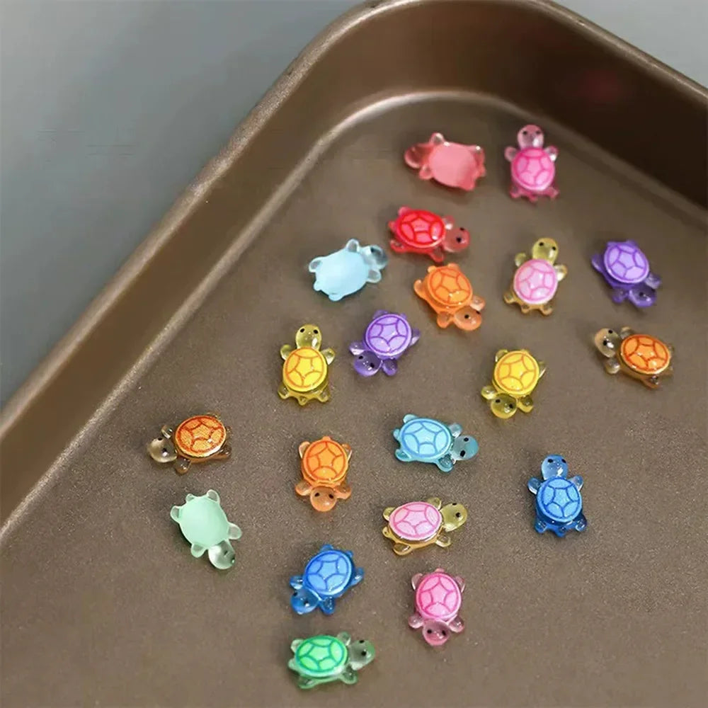 100 Piezas Mini Figuritas de Tortuga que Brillan en la Oscuridad – Miniaturas de Tortuga de Resina para Jardines de Hadas, Micropaisajismo, Decoración de Acuarios y Manualidades DIY