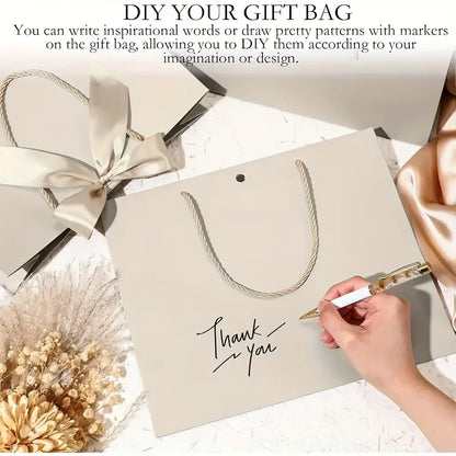 10 bolsas de regalo beige de "agradecimiento" con moños dorados – Elegantes bolsas de papel plegables para compras para recuerdos de bodas, regalos de fiestas y eventos