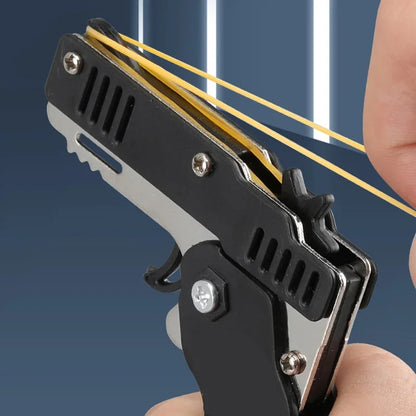 Llavero de pistola de goma de metal - Mini pistola de juguete de aleación con 60 gomas elásticas para juegos al aire libre, diversión en fiestas y regalos