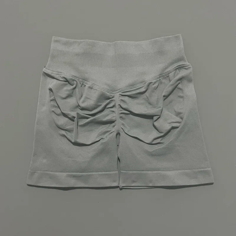 HISTELLO Pantalones cortos de yoga sin costuras de 4.5" para mujer – Pantalones cortos deportivos de talle bajo con efecto fruncido para gimnasio, fitness, correr y ropa deportiva