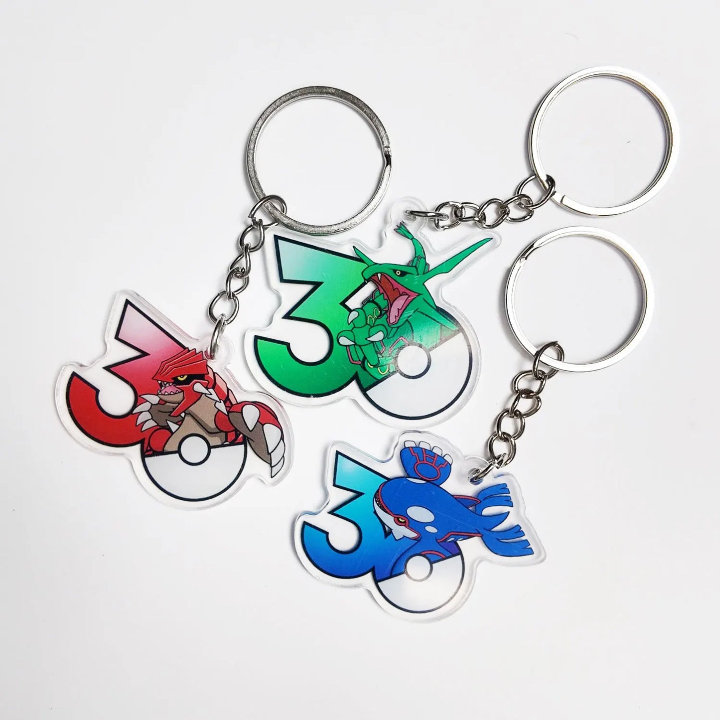Pokémon 30th Anniversary Acrylic Keychain – Captain Pikachu, Eevee & Eeveelutions (50 Styles)