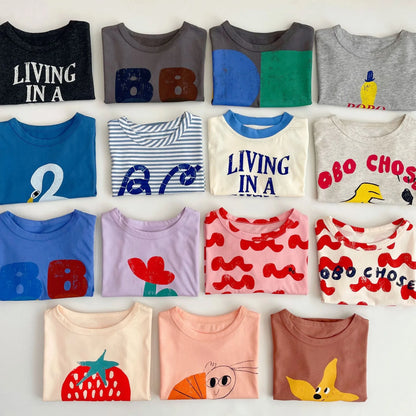 Camiseta de algodón con dibujos animados para niños 2025 – Top de manga corta estilo coreano de primavera-verano para bebés niños y niñas, ropa exterior informal para uso diario.