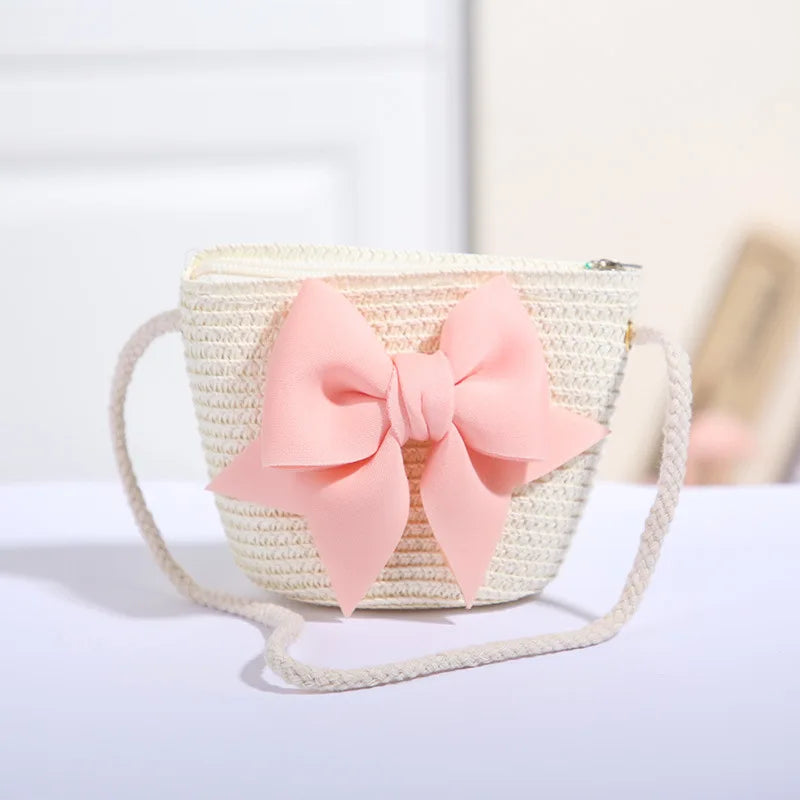 Bolso cruzado de paja con lazo rosa para niñas, cartera de mensajero tejida de princesa para niños con cremallera