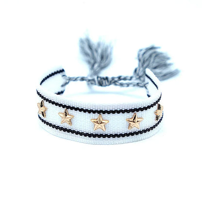 Bohemian Star Tassel Bracelet – Handmade Woven Alloy Gold Rivet Wrist Strap for Women | Ethnic Fashion Jewelry Gift