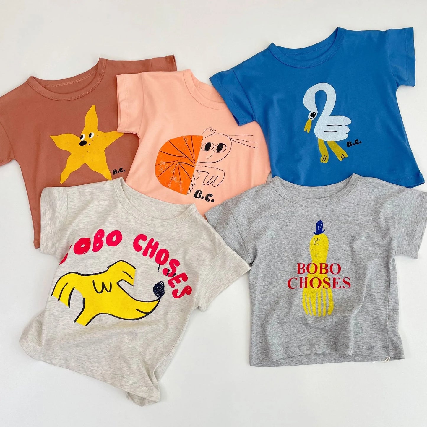 Camiseta de algodón con dibujos animados para niños 2025 – Top de manga corta estilo coreano de primavera-verano para bebés niños y niñas, ropa exterior informal para uso diario.