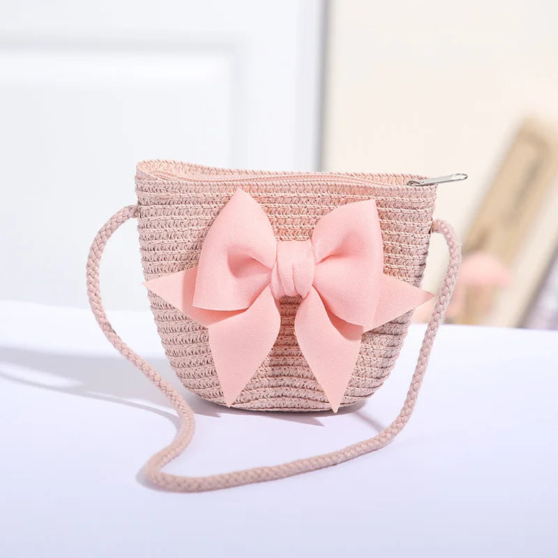 Bolso cruzado de paja con lazo rosa para niñas, cartera de mensajero tejida de princesa para niños con cremallera