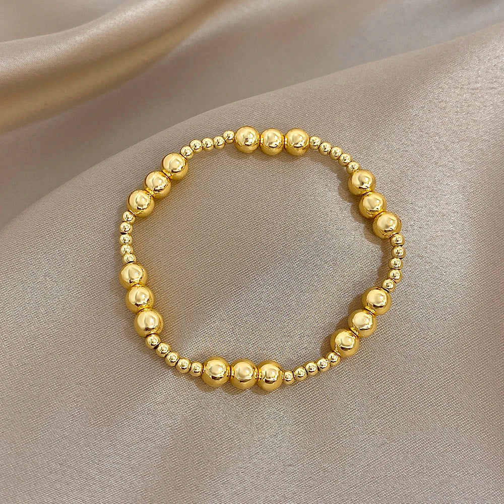 Pulsera de cuentas de acero inoxidable Greatera – Pulsera de cadena elástica tricolor bañada en oro de 3/4 mm para mujer | Regalo de joyería de moda impermeable