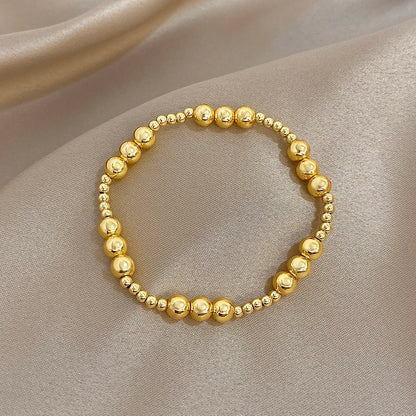 Pulsera de cuentas de acero inoxidable Greatera – Pulsera de cadena elástica tricolor bañada en oro de 3/4 mm para mujer | Regalo de joyería de moda impermeable