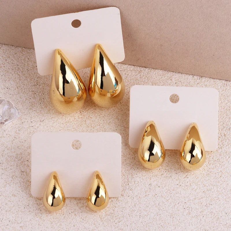 Pendientes de gota de agua gruesos en color dorado de moda 2024 – Pendientes colgantes de lágrima brillantes para mujer, accesorios de joyería de moda llamativos, pendientes de estilo personal y regalo