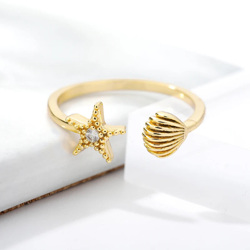 Gold Stainless Steel Starfish & Shell Ring – Adjustable Waterproof Beach-Inspired Ring for Women