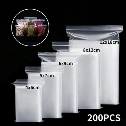 100/200 bolsas transparentes con cierre de cremallera – Bolsas de plástico gruesas resellables para alimentos, joyas, organización de cocina, almacenamiento de artículos pequeños y suministros de embalaje