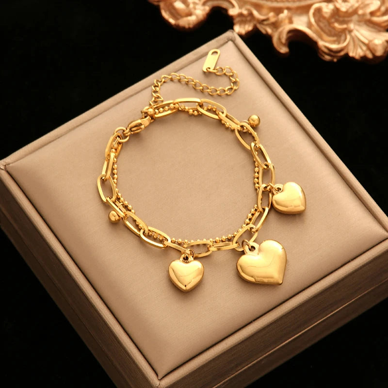 Pulsera de acero inoxidable 316L con dijes de estrellas de mar, luna y estrellas doradas – Cadena de muñeca moderna para mujer, regalo de joyería para fiestas