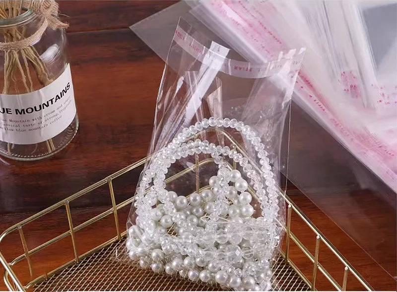 100 sacs auto-adhésifs transparents en OPP – Sachets d'emballage en plastique refermables pour vêtements, bijoux, biscuits, bonbons et emballage cadeau