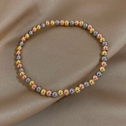 Pulsera de cuentas de acero inoxidable Greatera – Pulsera de cadena elástica tricolor bañada en oro de 3/4 mm para mujer | Regalo de joyería de moda impermeable
