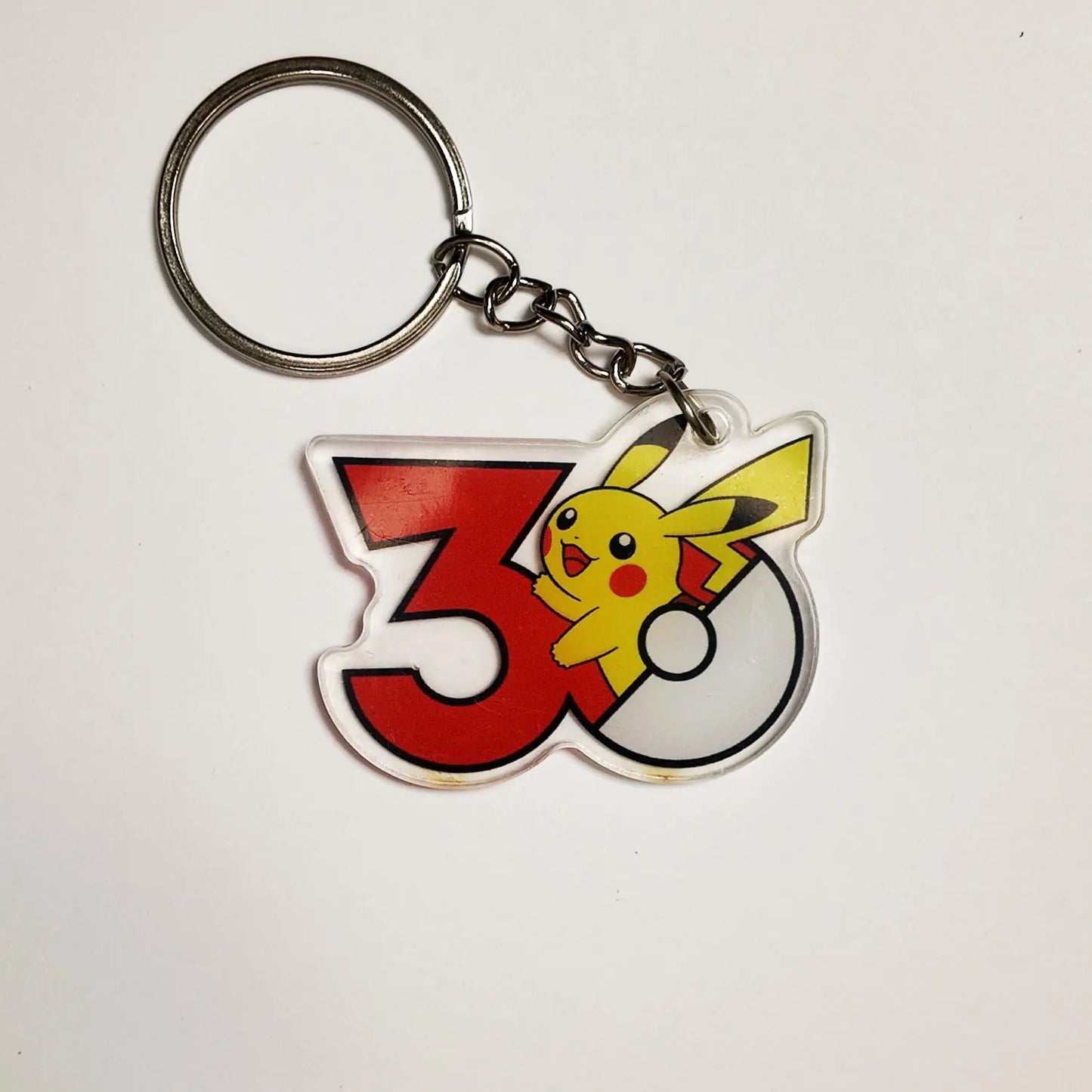 Pokémon 30th Anniversary Acrylic Keychain – Captain Pikachu, Eevee & Eeveelutions (50 Styles)