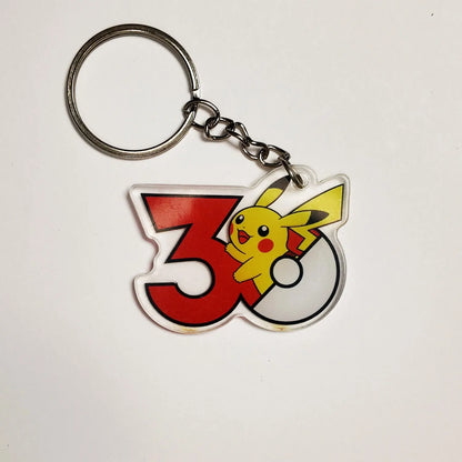 Pokémon 30th Anniversary Acrylic Keychain – Captain Pikachu, Eevee & Eeveelutions (50 Styles)