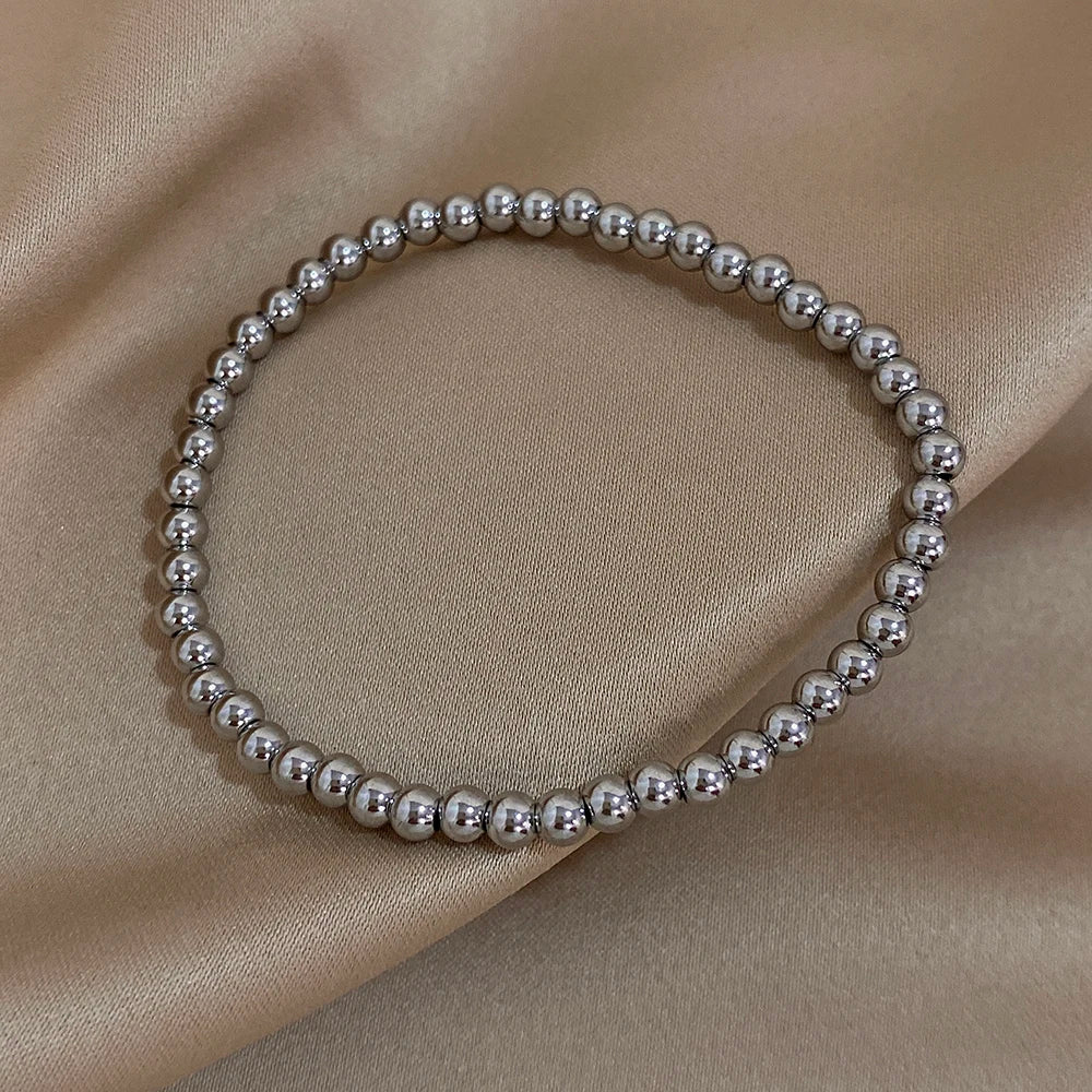 Pulsera de cuentas de acero inoxidable Greatera – Pulsera de cadena elástica tricolor bañada en oro de 3/4 mm para mujer | Regalo de joyería de moda impermeable
