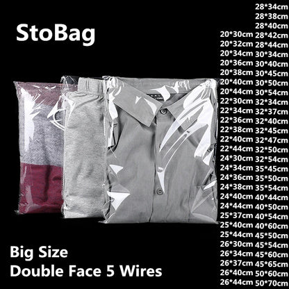 StoBag 100 sacs auto-scellants transparents pour vêtements – Sacs d'emballage en plastique transparent avec fermeture adhésive pour t-shirts, cadeaux, mariages et fêtes
