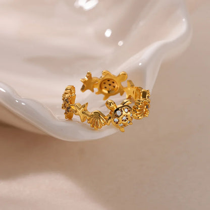 Gold Stainless Steel Starfish & Shell Ring – Adjustable Waterproof Beach-Inspired Ring for Women
