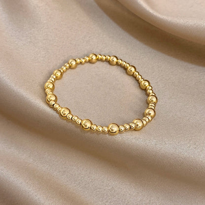 Pulsera de cuentas de acero inoxidable Greatera – Pulsera de cadena elástica tricolor bañada en oro de 3/4 mm para mujer | Regalo de joyería de moda impermeable