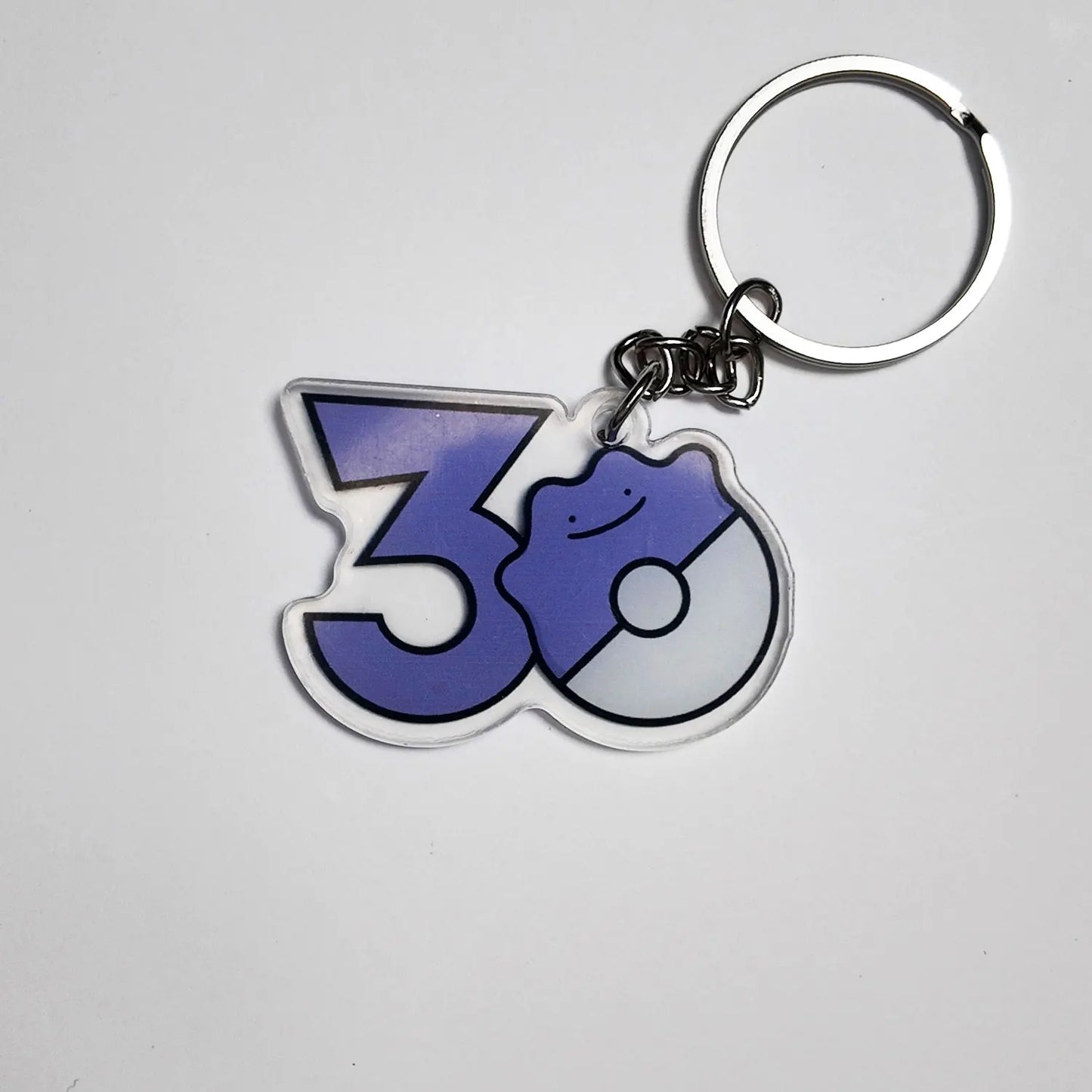 Pokémon 30th Anniversary Acrylic Keychain – Captain Pikachu, Eevee & Eeveelutions (50 Styles)