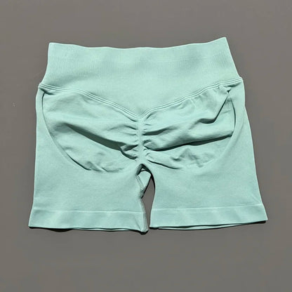 HISTELLO Pantalones cortos de yoga sin costuras de 4.5" para mujer – Pantalones cortos deportivos de talle bajo con efecto fruncido para gimnasio, fitness, correr y ropa deportiva