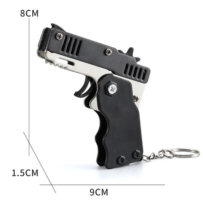 Llavero de pistola de goma de metal - Mini pistola de juguete de aleación con 60 gomas elásticas para juegos al aire libre, diversión en fiestas y regalos