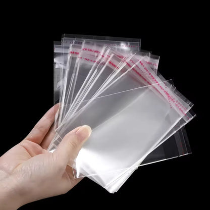 100 sacs auto-adhésifs transparents en OPP – Sachets d'emballage en plastique refermables pour vêtements, bijoux, biscuits, bonbons et emballage cadeau