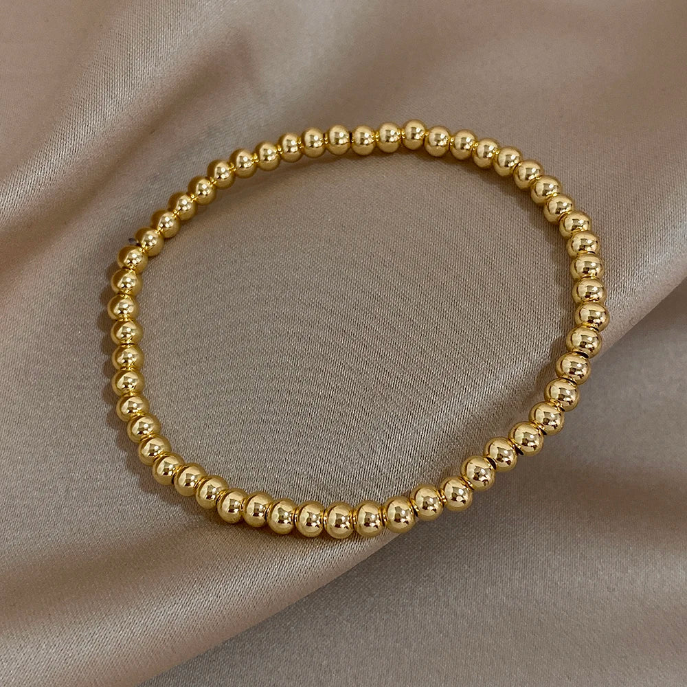 Pulsera de cuentas de acero inoxidable Greatera – Pulsera de cadena elástica tricolor bañada en oro de 3/4 mm para mujer | Regalo de joyería de moda impermeable