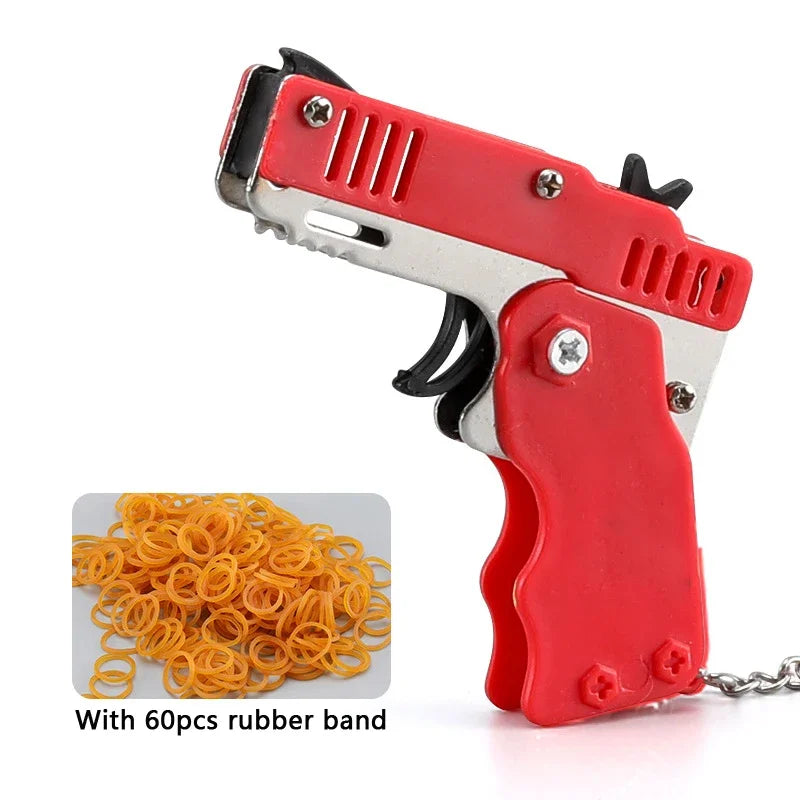 Llavero de pistola de goma de metal - Mini pistola de juguete de aleación con 60 gomas elásticas para juegos al aire libre, diversión en fiestas y regalos