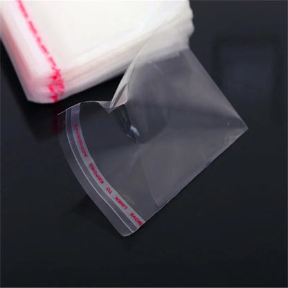 100 bolsas de plástico transparentes autosellables – Bolsas de embalaje adhesivas transparentes para joyas, dulces, galletas y pequeños regalos