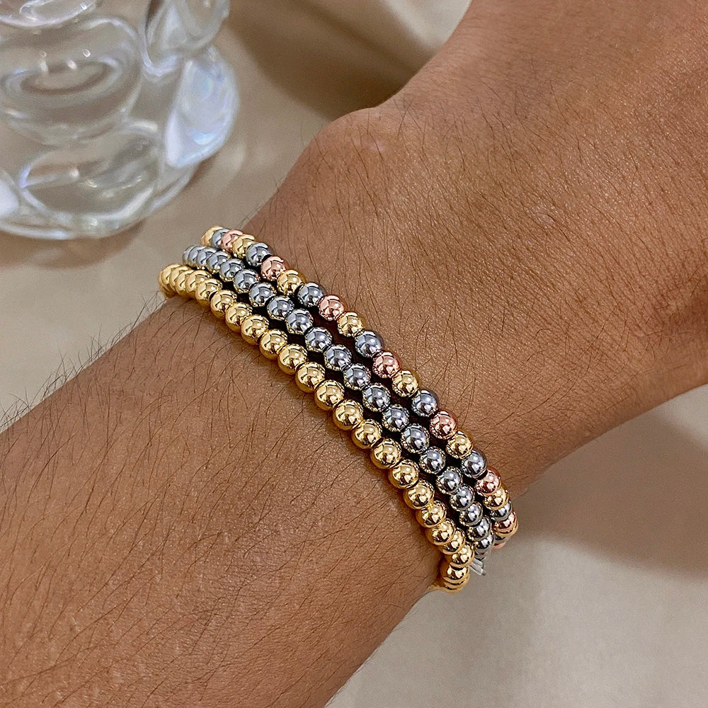 Pulsera de cuentas de acero inoxidable Greatera – Pulsera de cadena elástica tricolor bañada en oro de 3/4 mm para mujer | Regalo de joyería de moda impermeable