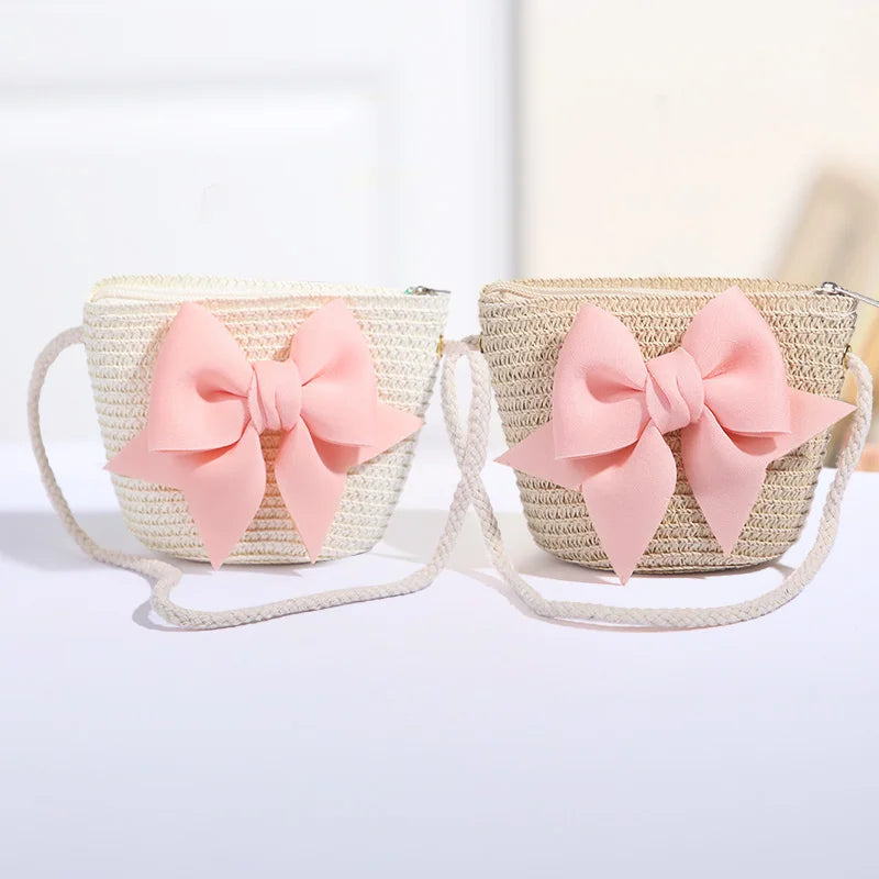 Bolso cruzado de paja con lazo rosa para niñas, cartera de mensajero tejida de princesa para niños con cremallera