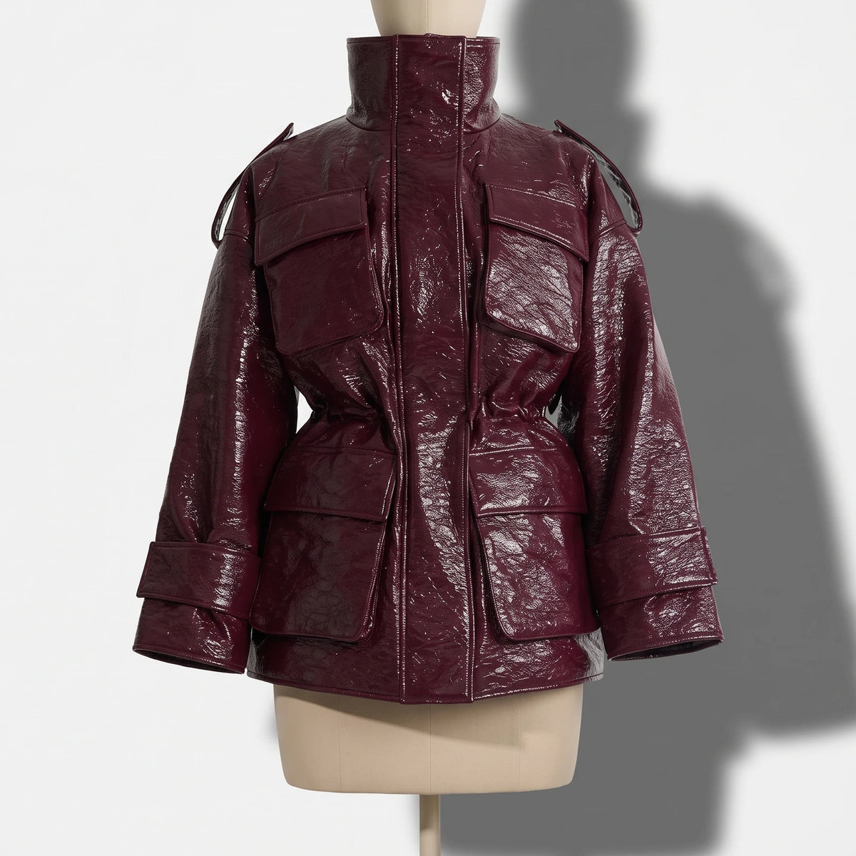 Women’s Burgundy Patent Leather Puffer Jacket – Mid-Length Winter Coat with Stand Collar, Epaulets, Multi-Pockets & Drawstring Waist