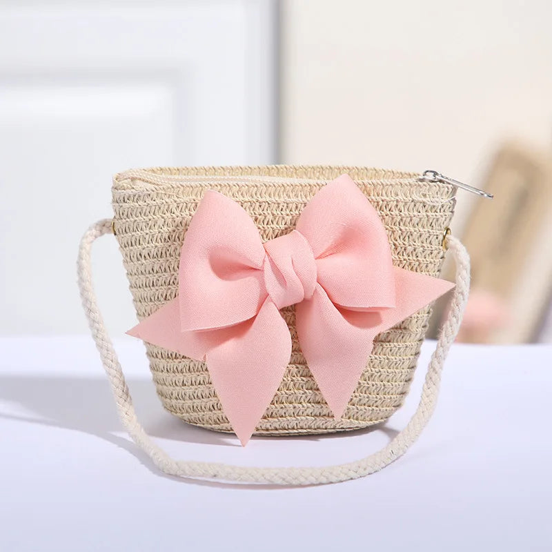 Bolso cruzado de paja con lazo rosa para niñas, cartera de mensajero tejida de princesa para niños con cremallera