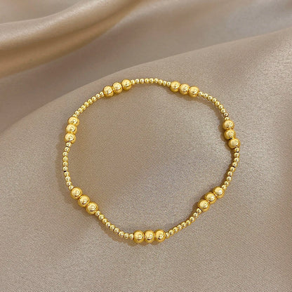 Pulsera de cuentas de acero inoxidable Greatera – Pulsera de cadena elástica tricolor bañada en oro de 3/4 mm para mujer | Regalo de joyería de moda impermeable