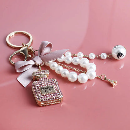 Imitation Pearl Perfume Bottle Keychain – Cute Bow Car Key Ring & Fashion Bag Charm Accessory for Women and Girls