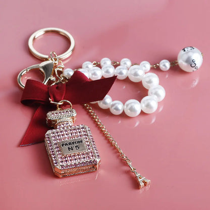 Imitation Pearl Perfume Bottle Keychain – Cute Bow Car Key Ring & Fashion Bag Charm Accessory for Women and Girls