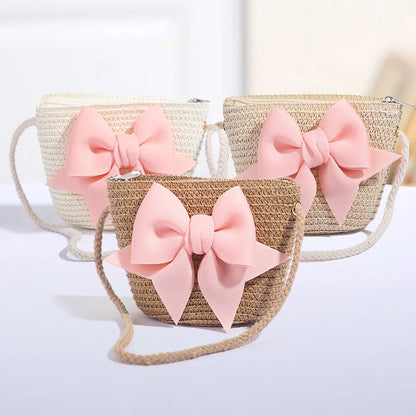 Bolso cruzado de paja con lazo rosa para niñas, cartera de mensajero tejida de princesa para niños con cremallera