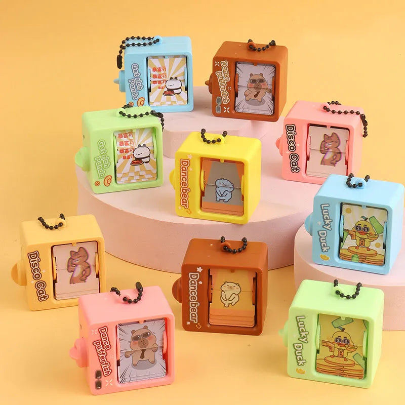 Cartoon Book Flipping Animation Machine Keychain – Creative Backpack Pendant Decompression Fidget Toy, Novelty Small Gift