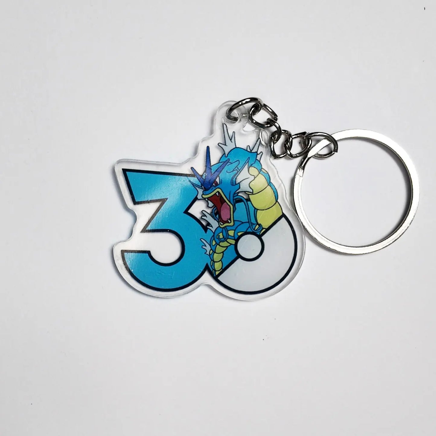 Pokémon 30th Anniversary Acrylic Keychain – Captain Pikachu, Eevee & Eeveelutions (50 Styles)