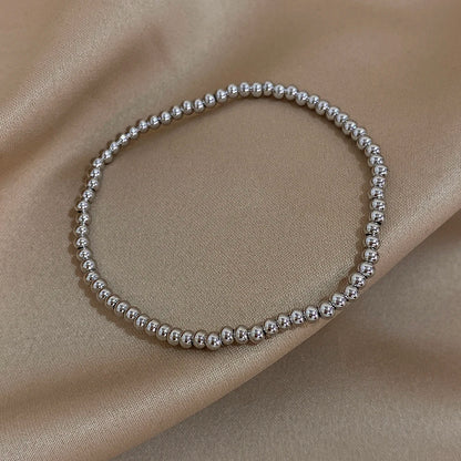 Pulsera de cuentas de acero inoxidable Greatera – Pulsera de cadena elástica tricolor bañada en oro de 3/4 mm para mujer | Regalo de joyería de moda impermeable