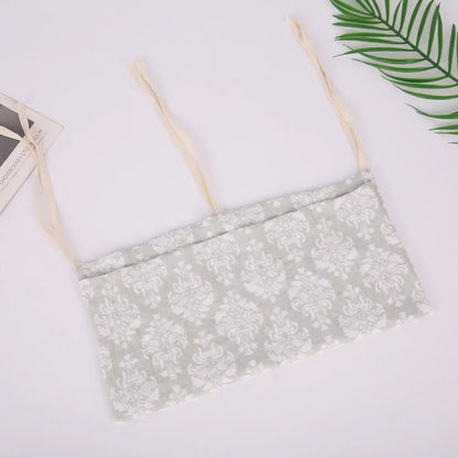 Organizador Colgante para Cuna de Bebé – Cesta de Almacenamiento para Mesita de Noche con 2 Bolsillos para Pañales, Juguetes, Ropa y Artículos Esenciales para Bebés