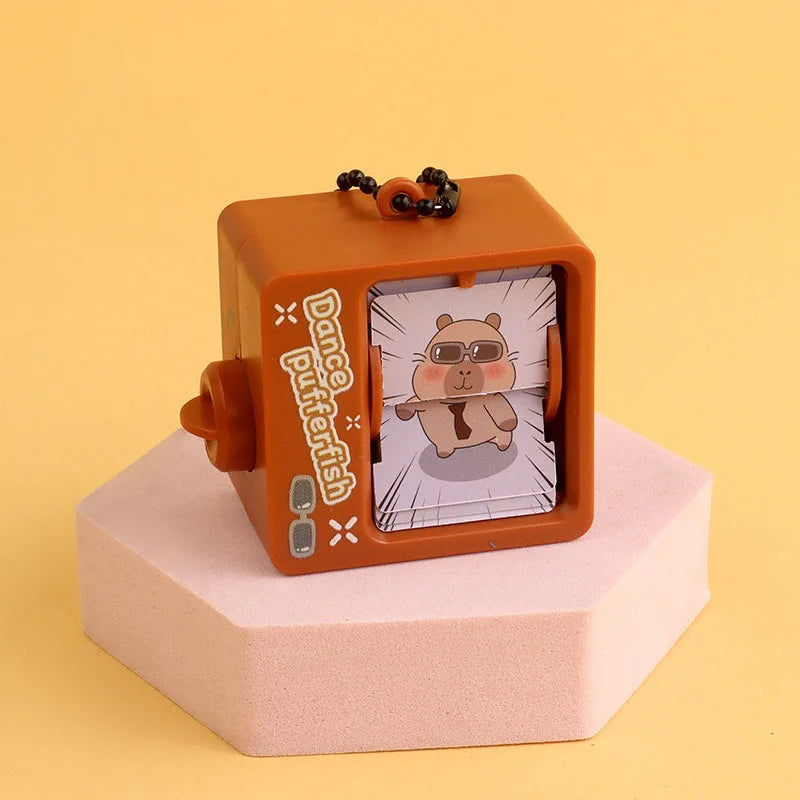 Cartoon Book Flipping Animation Machine Keychain – Creative Backpack Pendant Decompression Fidget Toy, Novelty Small Gift