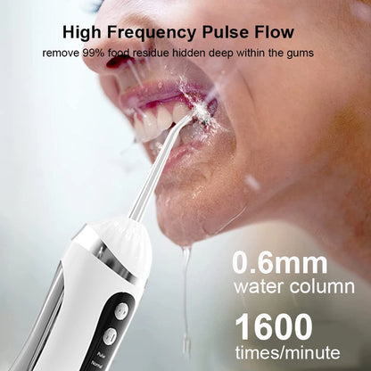 Irrigador bucal portátil USB recargable – Irrigador bucal impermeable IP65 con 3 modos de limpieza y 4 boquillas